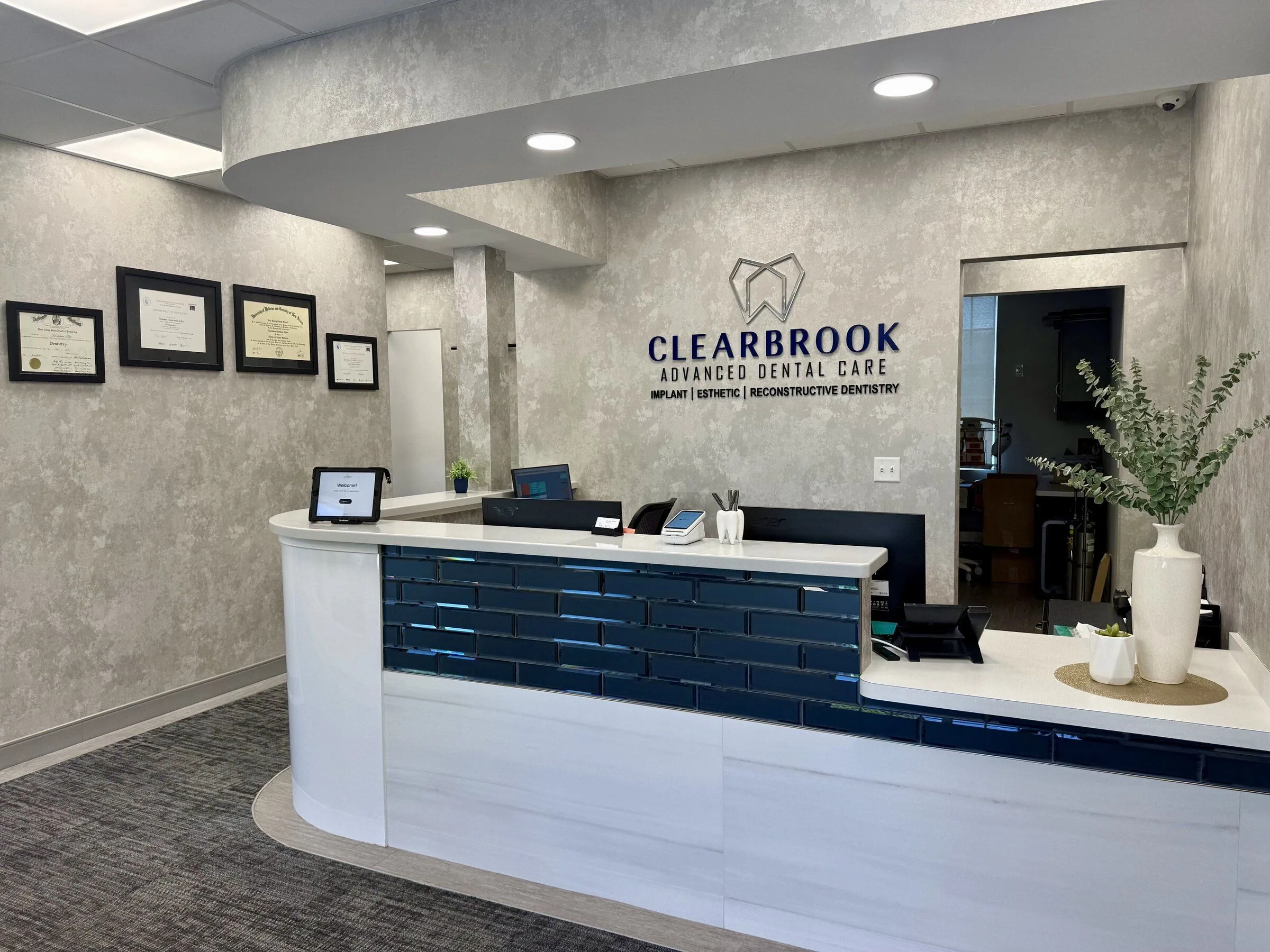 The welcoming reception desk at Clearbrook Advanced Dental Care in Cranbury, NJ